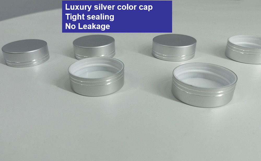 Botão de cápsulas de plástico azul PET de 100 ml com tampa de parafuso prateado